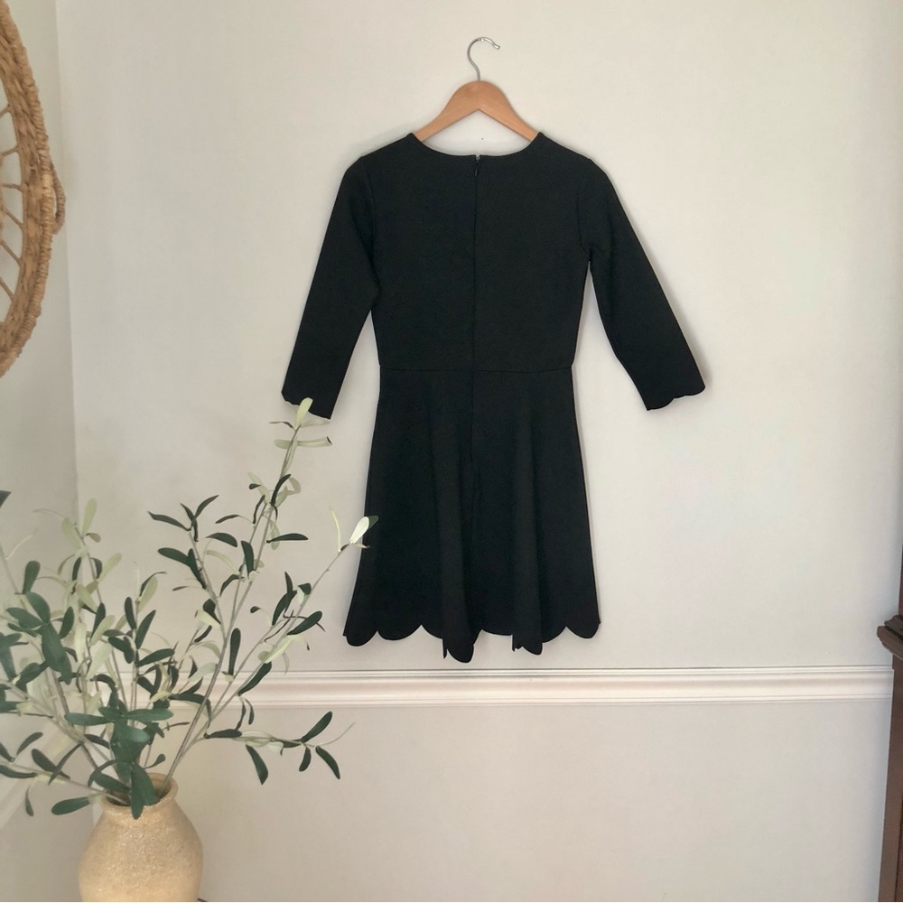 Lulus semi formal black long sleeve skater dress,scalloped sleeve/hem Size med
